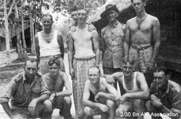 ? Company, Malaya, 1941
"A group of the lads. The one wearing a sort of dress is only wearing the type of thing all the male natives wear"
Left to right:
Back row:
1) unknown
2) unknown
3) unknown
4) unknown
5) unknown
Front row:
1) unknown
2) unknown
3) unknown
4) unknown
5) unknown
Keywords: NX72575