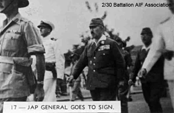 Japanese surrender, Singapore, 1945 (Photo 17)
017 - Jap General goes to sign - Senior Japanese officers being escorted to the Singapore Municipal Buildings for the signing of the surrender terms. 
