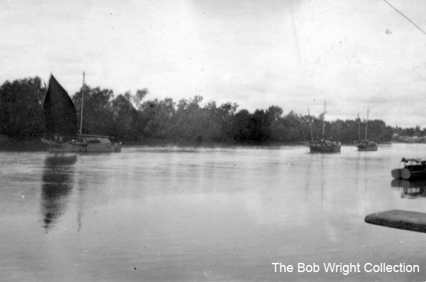 Batu Pahat
The river and a few "praus".

1. The photographs are to be known as The Bob Wright Collection.
2. Reproduction of the Collection or any part of it is prohibited without written permission.
3. Permission is granted to the 2/30th Batallion Association to reproduce the Collection as it deems appropriate.
4. Permission is granted to the Australian War Memorial Museum to reproduce the Collection as it deems appropriate.
5. All other permission is specifically withheld.
6. Written application for permission to reproduce the Collection, or part of it, may be made to:
Mr I. Wright
95 Hewitt Avenue
Wahroonga 2076 New South Wales

