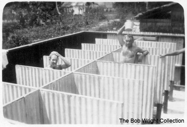Showers at Batu Pahat
"These are the showers I told you about. Oct. 1941"

NX36166 - WRIGHT, Robert, Cpl. - HQ Coy. Sig. Pl. 

1. The photographs are to be known as The Bob Wright Collection.
2. Reproduction of the Collection or any part of it is prohibited without written permission.
3. Permission is granted to the 2/30th Batallion Association to reproduce the Collection as it deems appropriate.
4. Permission is granted to the Australian War Memorial Museum to reproduce the Collection as it deems appropriate.
5. All other permission is specifically withheld.
6. Written application for permission to reproduce the Collection, or part of it, may be made to:
Mr I. Wright
95 Hewitt Avenue
Wahroonga 2076 New South Wales

