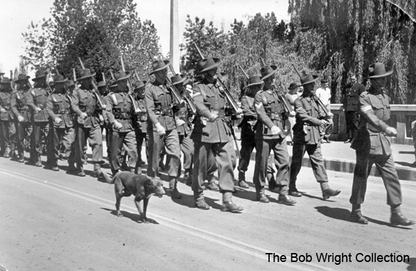 Parade through Wagga Wagga, Sept. 1940
1. The photographs are to be known as The Bob Wright Collection.
2. Reproduction of the Collection or any part of it is prohibited without written permission.
3. Permission is granted to the 2/30th Batallion Association to reproduce the Collection as it deems appropriate.
4. Permission is granted to the Australian War Memorial Museum to reproduce the Collection as it deems appropriate.
5. All other permission is specifically withheld.
6. Written application for permission to reproduce the Collection, or part of it, may be made to:
Mr I. Wright
95 Hewitt Avenue
Wahroonga 2076 New South Wales

