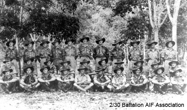 C Company, 14 Platoon, 4, 5 & 6 Sections
At Batu Pahat.

Left to right:
Back row: 6 Section
1) NX47209 - KENNEDY, Thomas Joseph Frederick (Tom), A/U/Sgt. - C Coy. 14 Pl. 
2) NX47292 - OSMOND, George Alwyn, A/Cpl. - C Coy. 14 Pl. WiA Sempang Rengam
3) NX46983 - McLAREN, Hilton Stanley, Pte. - C Coy. 15A Pl. WiA Sempang Rengam
4) NX46605 - McEWEN, Charles, Pte. - C Coy. 14 Pl. WiA Sempang Rengam
5) NX15563 - VINCENT, Horace Robert William (Ossie), Pte. - C Coy. 15A Pl. Doi Nieke (Beri Beri, Dysentery, Anaemia)
6) NX66981 - DENGATE, Edgar Norman, Lt. - B Coy. O/C 12 Pl. Lt. from 10/11/1941
7) NX37366 - TOWERS, Keith Lloyd, L/Cpl. - C Coy. 14 Pl. 
8) NX37588 - FERGUSON, Ronald John, Pte. - C Coy. 14 Pl. KiA Sempang Rengam
9) NX46620 - KRUSE, Bruce Edward, Pte. - C Coy. 14 Pl. 
10) NX46640 - PHILP, Sydney Phillip (Sid), Pte. - C Coy. 14 Pl. Doi Sonkurai 1 (Cholera)
11) NX37702 - BICKNELL, Thomas John (Tom), L/Cpl. - C Coy. 15A Pl. 

Middle row: 5 Section
1) NX47748 - JOHNSON, George Edward Thomas (Big Johnno), A/U/Sgt. - C Company, 15A Platoon
2) NX46619 - KORSCH, John Donald, Cpl. - C Coy. 14 Pl. 
3) NX37388 - FINN, James Allen (Jim), Pte. - C Coy. 14 Pl. Doi Sandakan
4) NX47752 - NEWMAN, Robert John (Bob), Pte. - C Coy. 14 Pl. 
5) NX47925 - RANKIN, Charles William (Bill), Pte. - C Coy. 14 Pl. Doi Sandakan
6) NX37631 - KNOX, Raymond Charles (Andy), Pte. - C Coy. 14 Pl. 
7) NX47104 - KITCHENER, Izra James (Jim), Pte. - C Coy. 14 Pl. Doi Kanburi (Beri Beri)
8) NX46603 - McKENZIE, Donald (Don), L/Cpl. - C Coy. 14 Pl. 
9) possibly NX37604 - HILTON, Emanuel Patrick (Mick), Pte. - D Company, 16 Platoon
10) NX47760 - MARSH, Stanley Frederick (Stan), Pte. - C Coy. 14 Pl. Doi Sonkurai 1 (Cholera)

Front row: 4 Section
1) NX59092 - STARK, Reginald (Reg), L/Cpl. - C Coy. 14 Pl. to Rose Force 23/12/1941, KiA Sempang Rengam (D Coy area)
2) NX37705 - O'ROURKE, Terence Percival (Terry), Pte. - C Coy. 14 Pl. 
3) NX47498 - GRANT, Thomas Bertram (Tom), L/Cpl. - C Coy. 14 Pl. 
4) NX37282 - COULTAS, Stanley Thomas (Stan), Pte. - C Coy. 14 Pl.
5) NX34950 - PARSONS, Ernest John (John), Lt. - C Coy. O/C 14 Pl. 
6) NX37599 - GREENWAY, Alfred John (Jack), Pte. - C Coy. 14 Pl. Rep 31/12/1941
7) NX47154 - MACOURT, Laurie Leo, Pte. - C Coy. 14 Pl. Doi Kanburi (Lobar Pneumonia)
8) NX69350 - MITCHELL, Jack (John Earl) (Jack), Pte. - C Coy. 14 Pl. 
9) NX36479 - HOLLOWAY, Maxwell George (Stanley), Pte. - C Coy. 14 Pl. MiA 12/2/1942
10) NX46920 - HEDWARDS, Cornelius Michael (Con), Pte. - C Coy. 14 Pl. 

Absent from photo:
1) NX2538 - JOHNSTON, Ronald Athol, Cpl. - C Coy. 14 Pl. 
2) NX17253 - LANE, John Charles (Dinny), Pte. - C Coy. 14 Pl. 
3) NX51236 - LAWSON, Robert George (Bob), Pte. - C Coy. 14 Pl. 
4) NX55568 - CONEN, Sidney Graham (Sid), Pte. - C Coy. 14 Pl. Doi Sonkurai 3 (Ulcers, Malnutrition)
